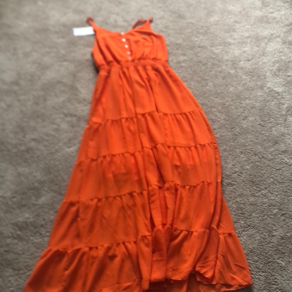 Brand new. Size 10/12 tangerine maxi dress.